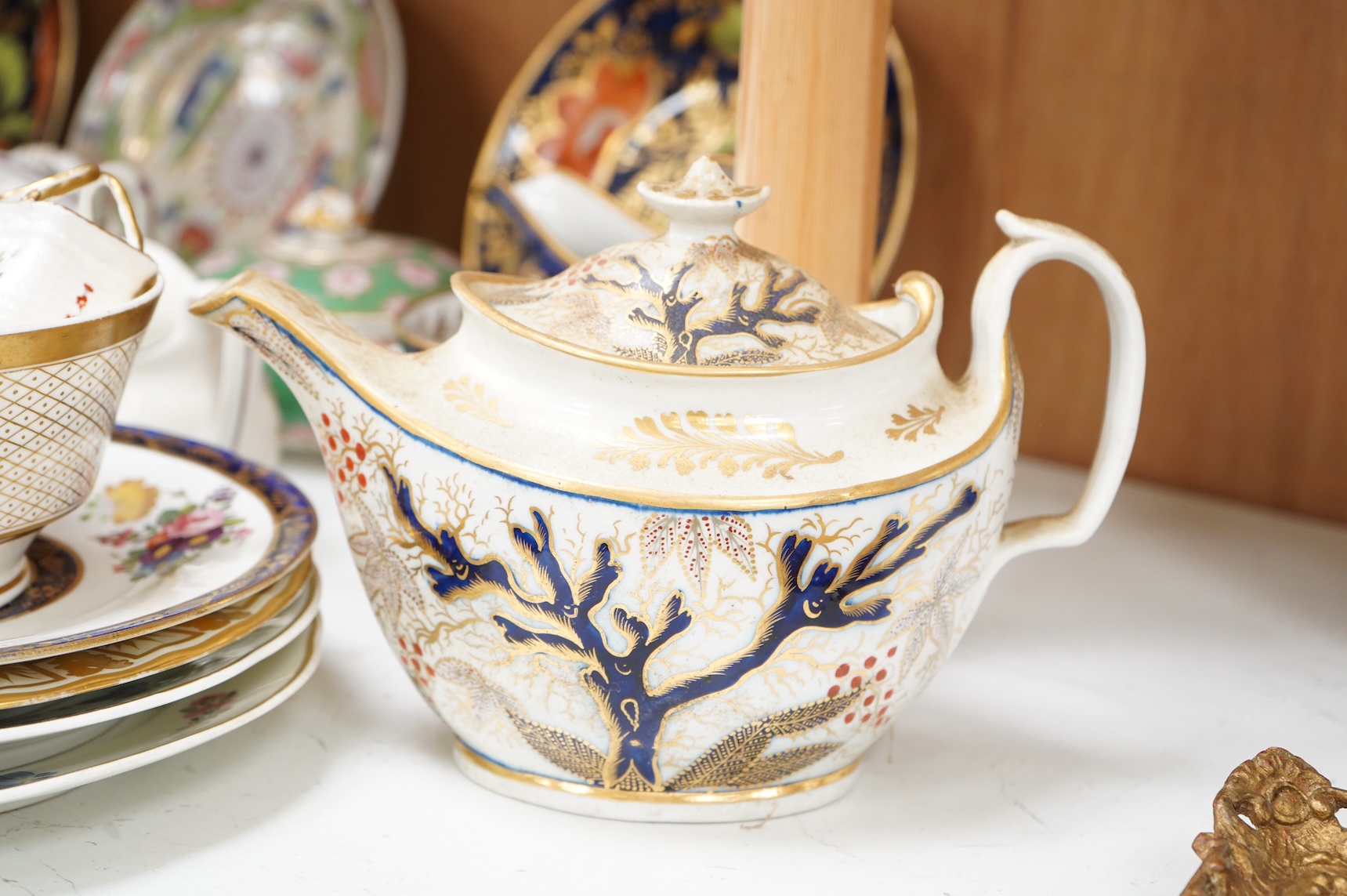 A collection of early 19th century English porcelain tea, dessert and dinner wares including Derby dessert plates, Bloor Derby, Barr Flight & Barr plate, Spode, Coalport etc.